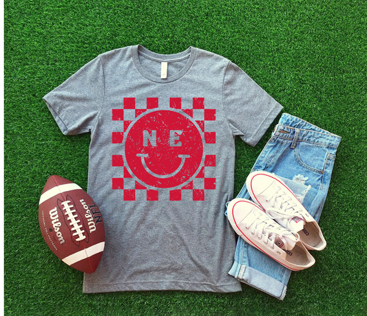 DTF NEBRASKA RED CHECKERED HAPPY FACE DISTRESSED TRANSFER